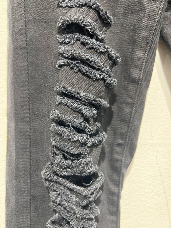 Billede af Sorte jeans med masser af cuts foran